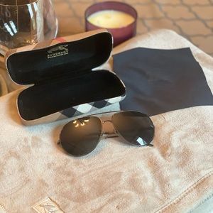 These authentic Burberry shades are gently used and are great for the sunshine.